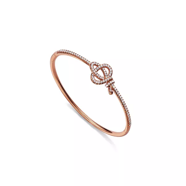 Bracelet à charnière en or rose 18 carats et diamants