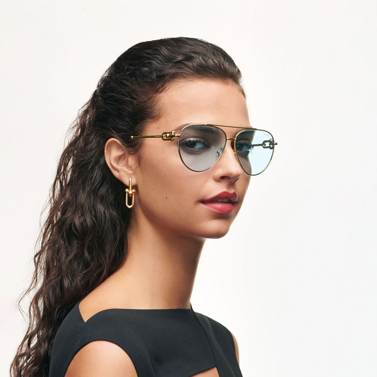 Sonnenbrille aus blassgoldfarbenem Metall