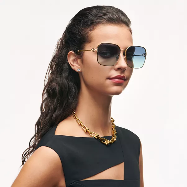 Sunglasses in Pale Gold-colored Metal