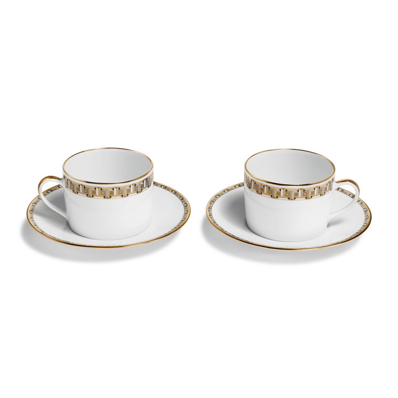Tasse und Untertasse in Schwarz mit Goldrand, 2er-Set