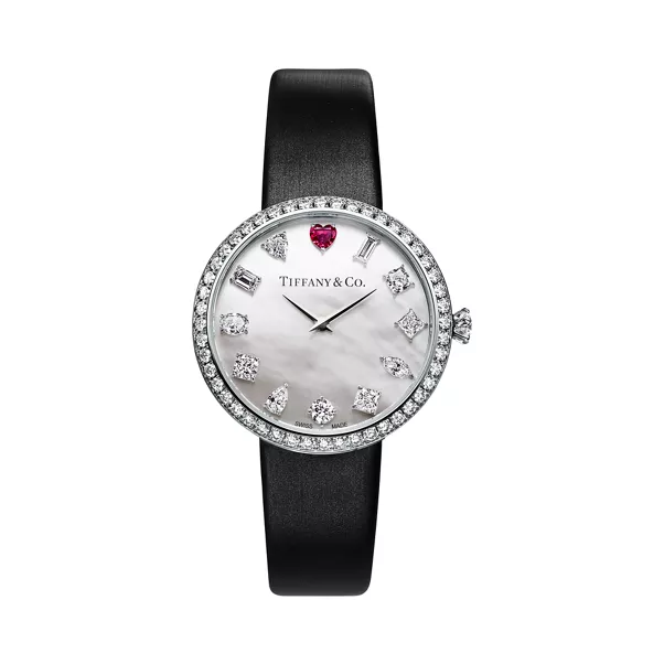 Reloj redondo de 32 mm en oro blanco con una rubelita y diamantes