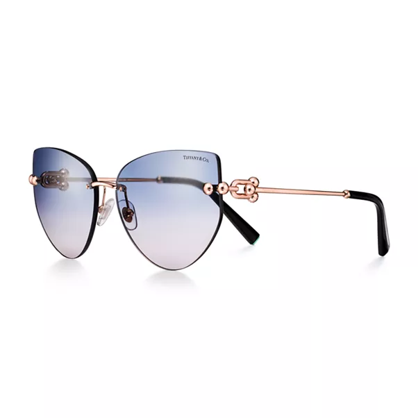 Occhiali da sole in metallo dorato rosa con lenti blu
