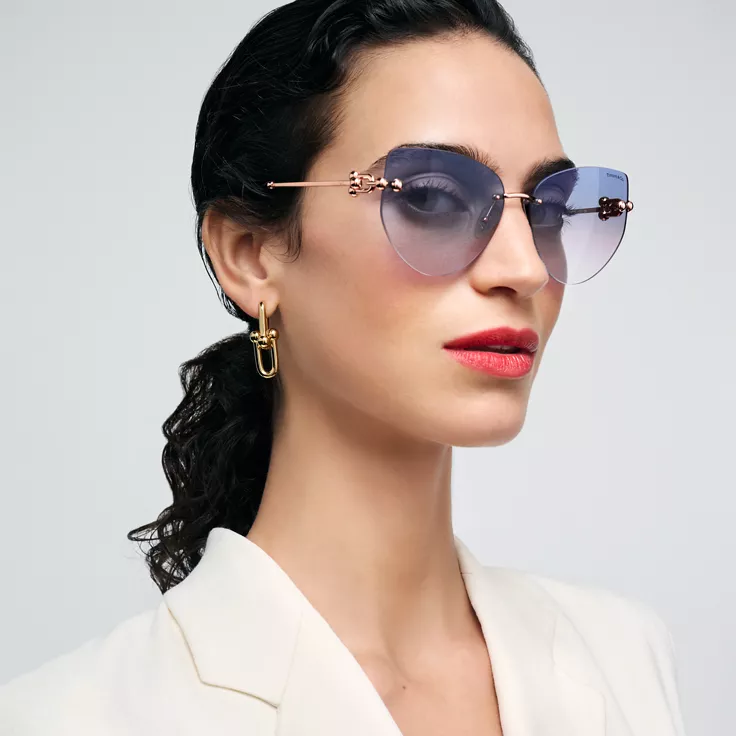 Collezione Tiffany HardWear:Occhiali da sole in metallo dorato rosa con lenti blu, 1