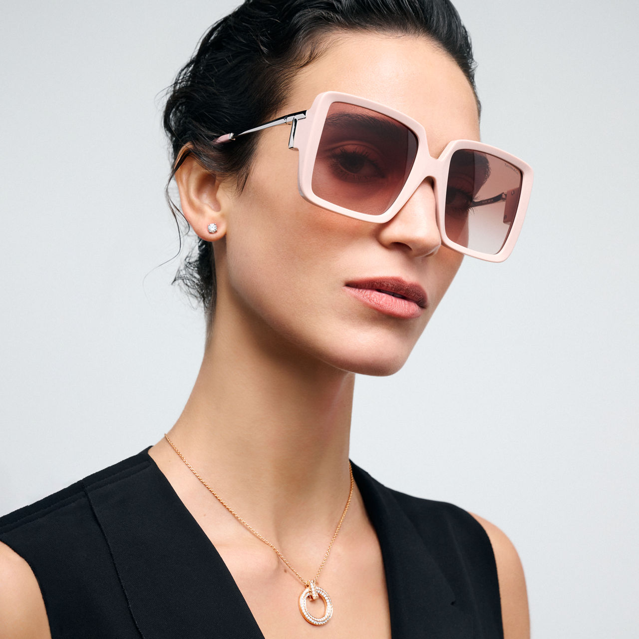 Sonnenbrille aus rosa Acetat mit Gläsern mit rosa Farbverlauf