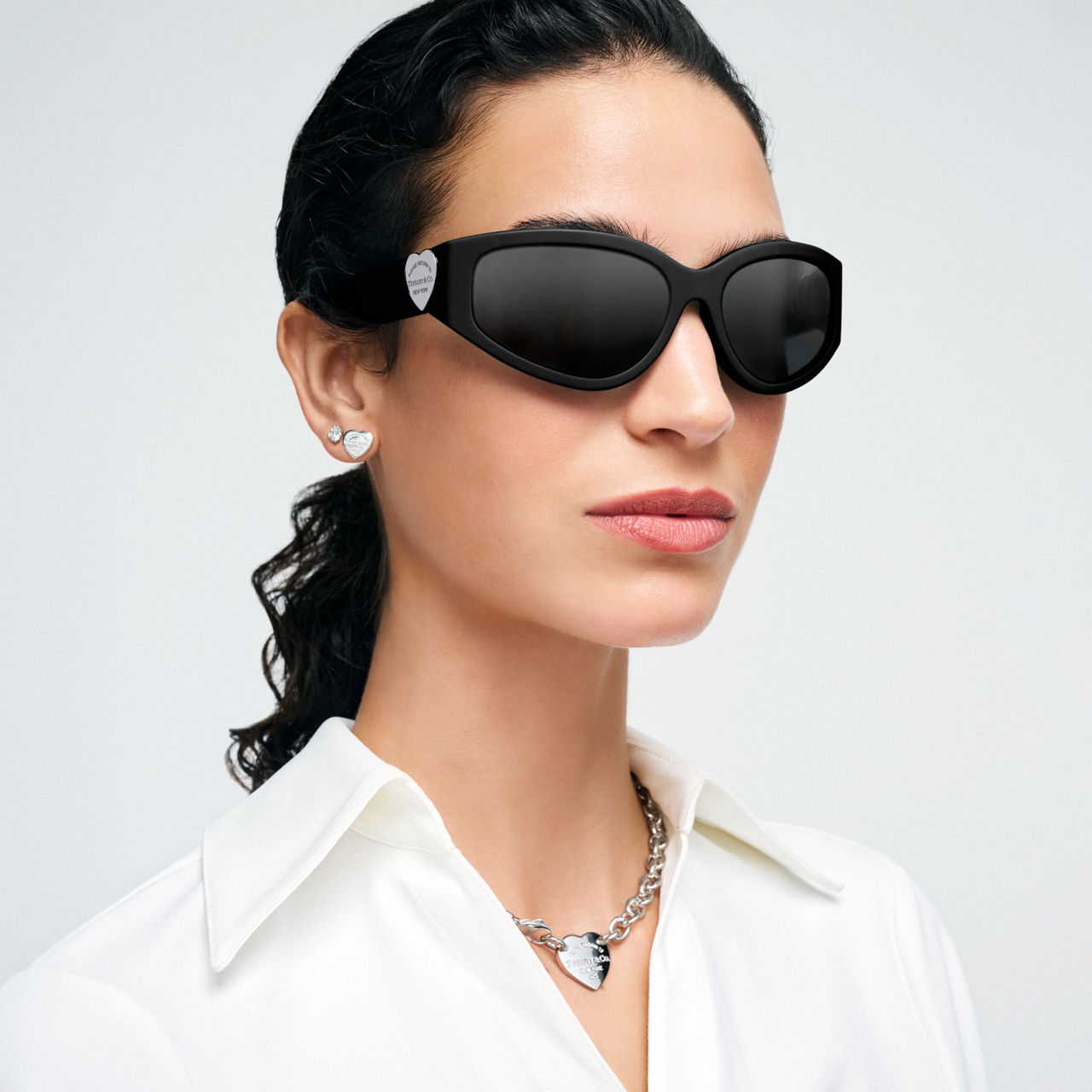 Sonnenbrille aus schwarzem Acetat mit verspiegelten grauen Gläsern