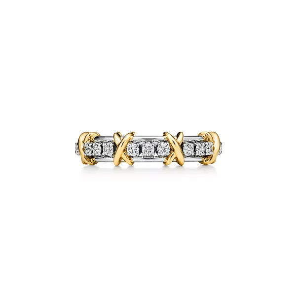Anillo estrecho de platino y oro amarillo con diamantes