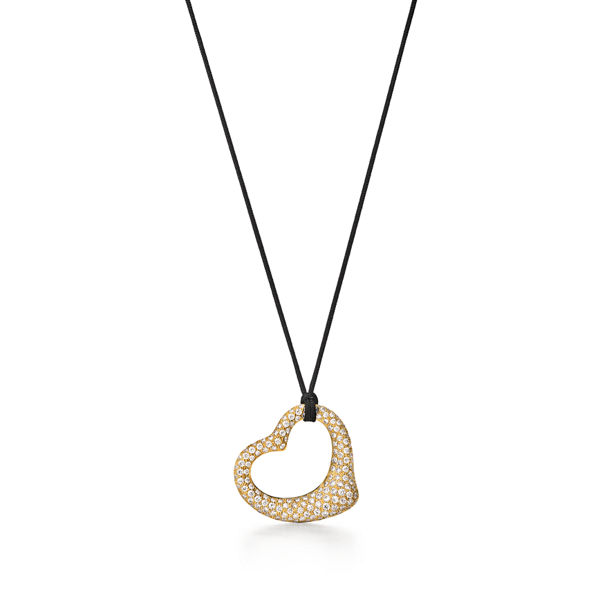 Elsa Peretti®:Open Heart Pendant in Yellow Gold with Pavé Diamonds & Black Silk