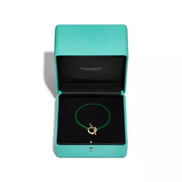 Elsa Peretti®:Open Heart Bracelet in Yellow Gold on a Green Silk Cord, 3