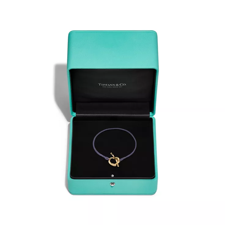 Elsa Peretti®:Open Heart Bracelet in Yellow Gold on a Purple Silk Cord, 4