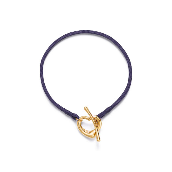 Elsa Peretti®:Open Heart Bracelet in Yellow Gold on a Purple Silk Cord