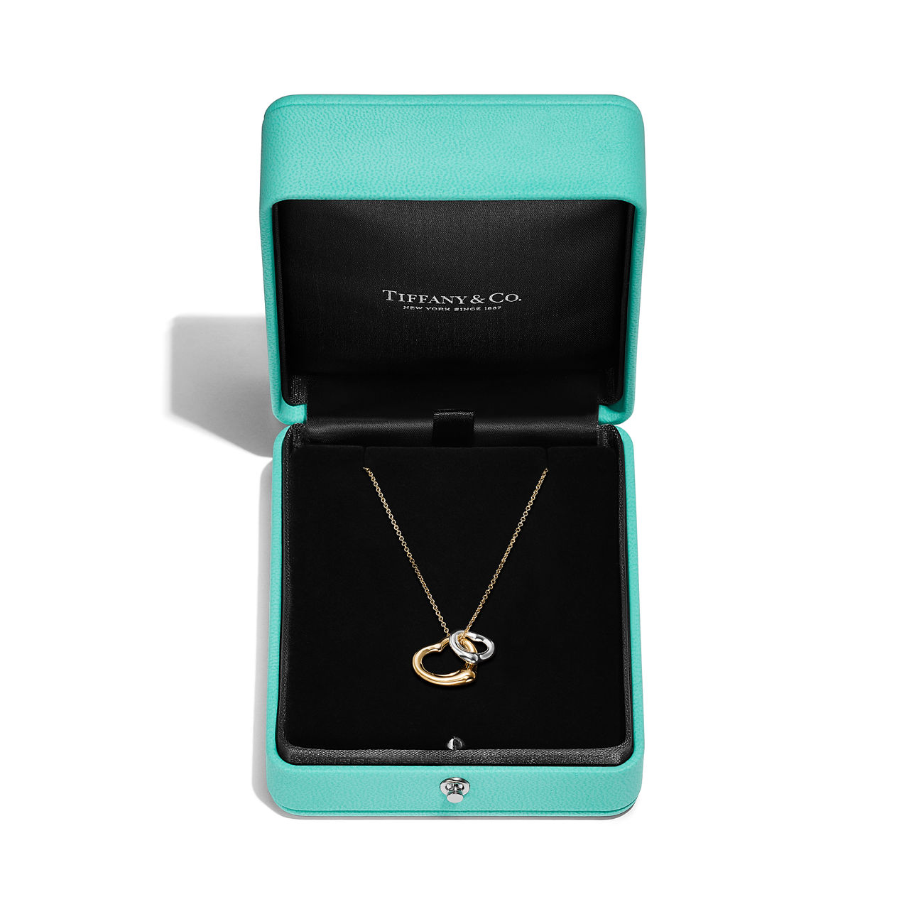 Elsa Peretti®:Open Heart Pendant in Yellow Gold and Sterling