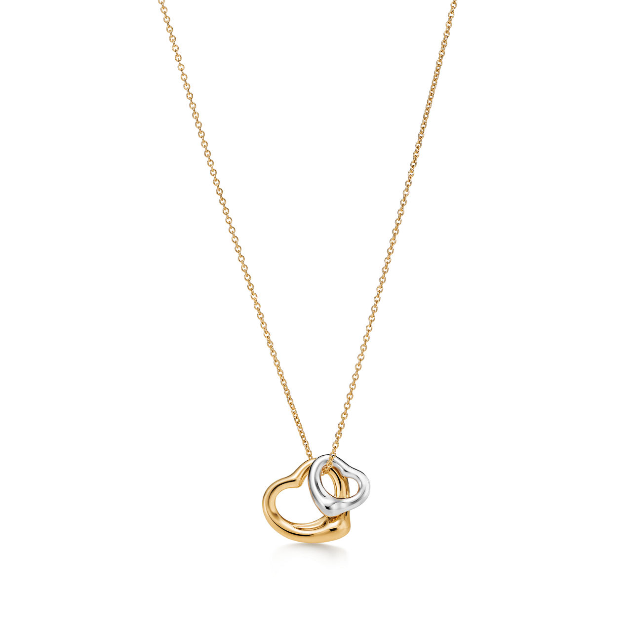 Elsa Peretti®:Open Heart Pendant in Yellow Gold and Sterling Silver image number 0