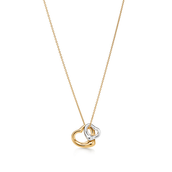 Elsa Peretti®:Open Heart Pendant in Yellow Gold and Sterling Silver