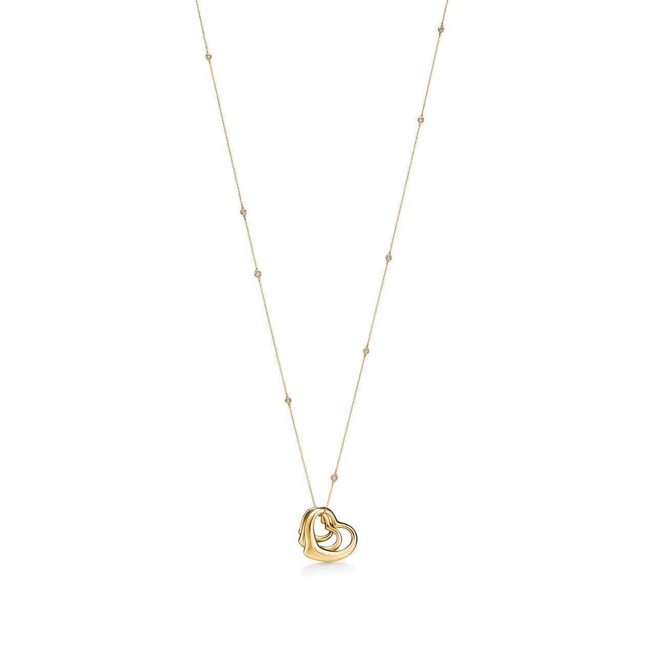 Elsa Peretti®:Open Heart and Diamonds by the Yard® Pendant in Gold with Diamonds image number 3