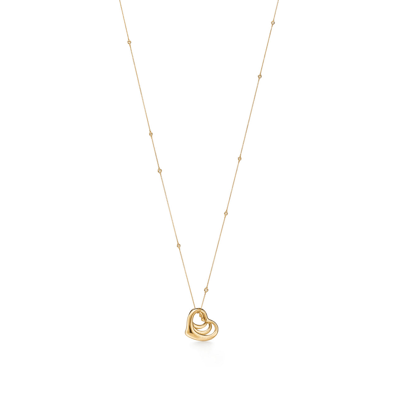 Elsa Peretti®:Open Heart and Diamonds by the Yard® Pendant in Yellow Gold image number 3