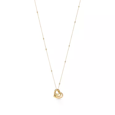 Elsa Peretti®:Open Heart and Diamonds by the Yard® Pendant in Yellow Gold, 3