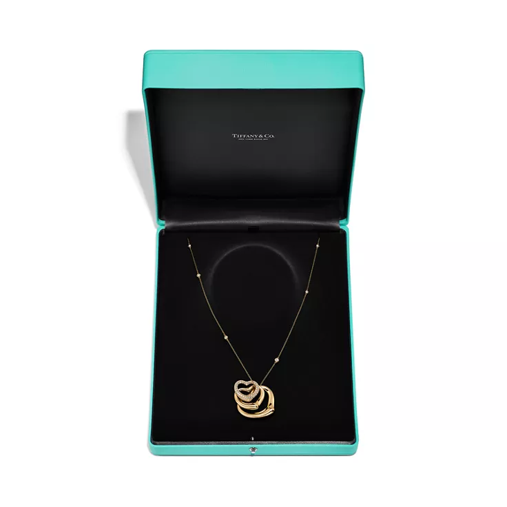 Elsa Peretti®:Open Heart and Diamonds by the Yard® Pendant in Yellow Gold, 5
