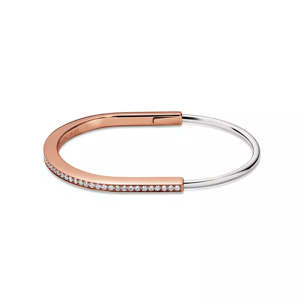 Schmaler Armreif in Rosé- und Weißgold mit halben Pavé-Diamanten