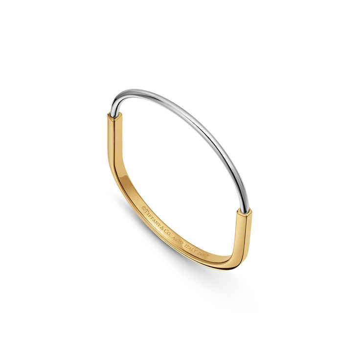 Tiffany Lock:Bracelet jonc étroit en or jaune et or blanc 18 carats numéro dimage {1}