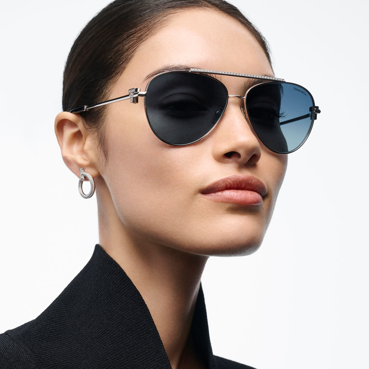 Sonnenbrille aus silberfarbenem Metall mit Gläsern mit Farbverlauf in Tiffany Blue®