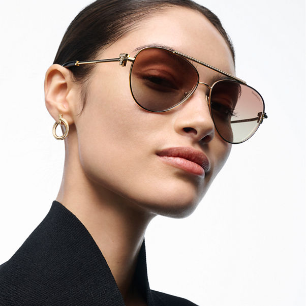 Tiffany T:Sonnenbrille aus blassgoldfarbenem Metall mit Gläsern mit rosa Farbverlauf