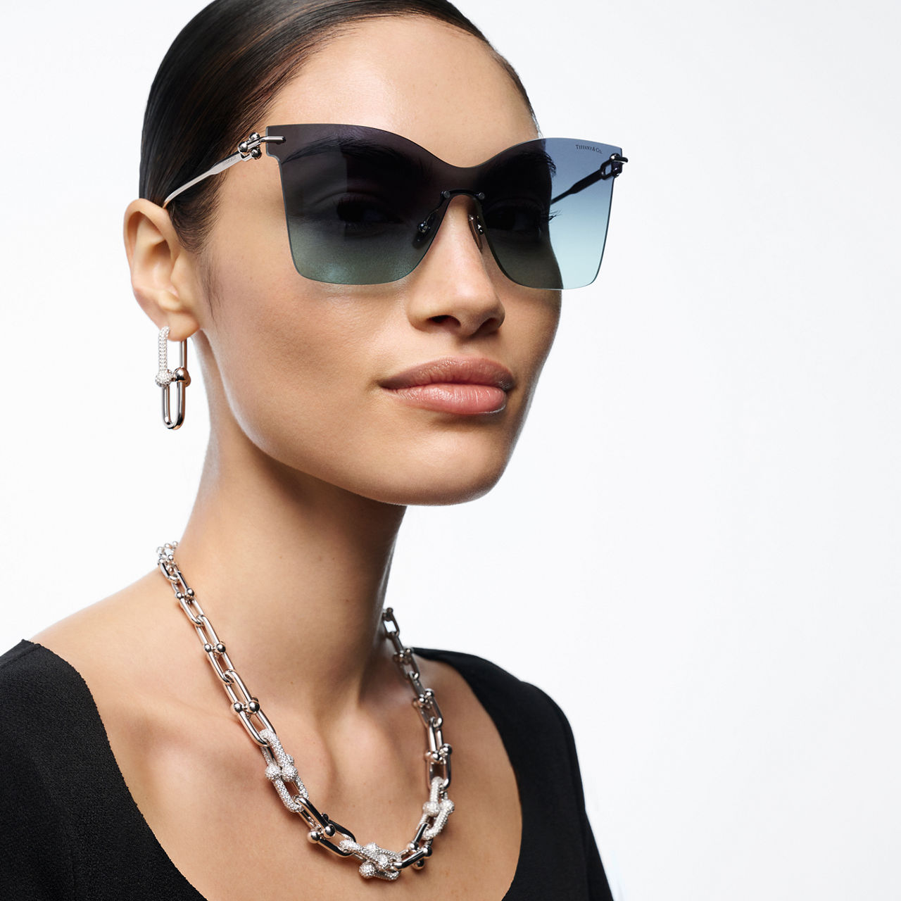 Sonnenbrille aus vergoldetem Metall mit Gläsern in Tiffany Blue®