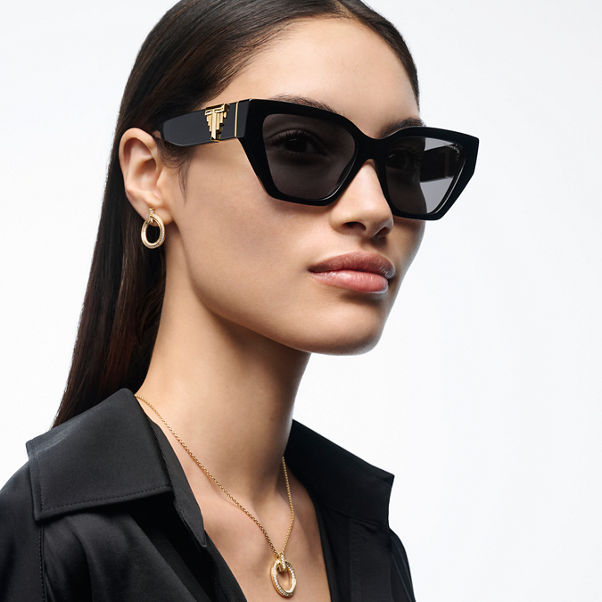 Tiffany T:Deco Sonnenbrille aus schwarzem Acetat, goldfarbenem Metall und grauen Gläsern