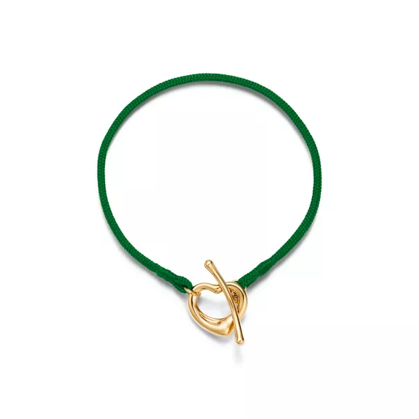 Open Heart Bracelet in Yellow Gold on a Green Silk Cord
