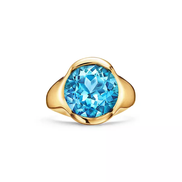 Fancy Color Ring in Gelbgold mit einem Blautopas
