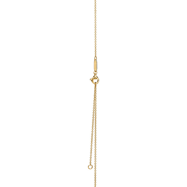 Return to Tiffany™:Mini Heart Tag Pendant in Yellow Gold with a Diamond image number 5