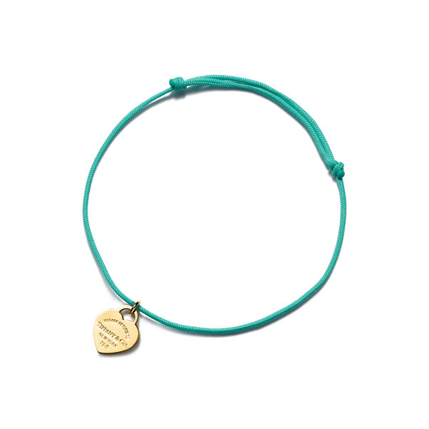 Return to Tiffany™:Armband mit Herzanhänger in Gelbgold an einer Kordel in Tiffany Blue®