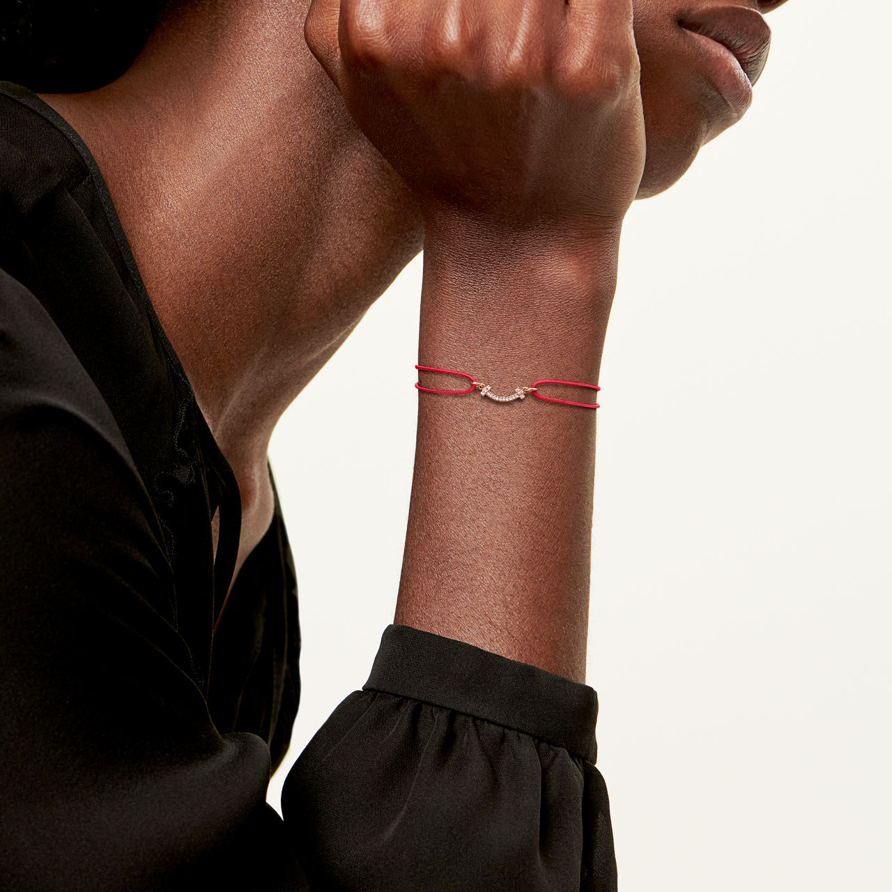 Smile Bracelet in Rose Gold on a Red Cord with Diamonds