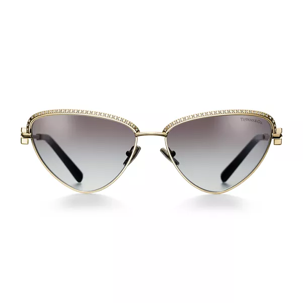 Gafas de sol de metal chapado en oro con cristales color gris