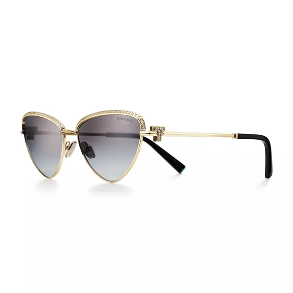 Gafas de sol de metal chapado en oro con cristales color gris