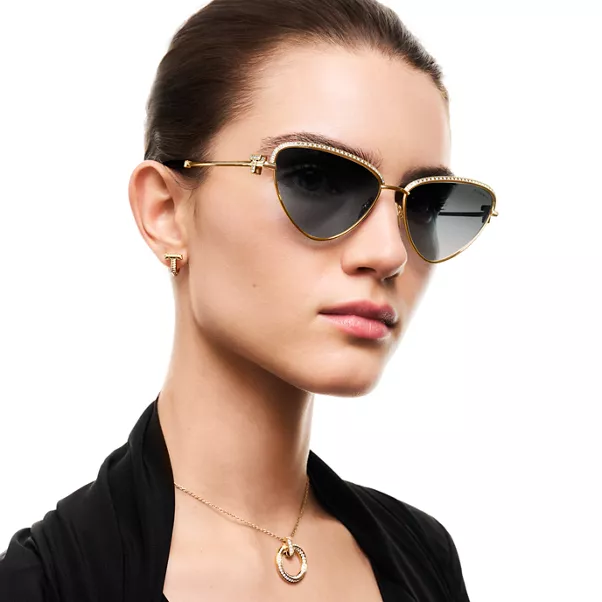 Collezione T by Tiffany:Occhiali da sole in metallo placcato oro con lenti grigie