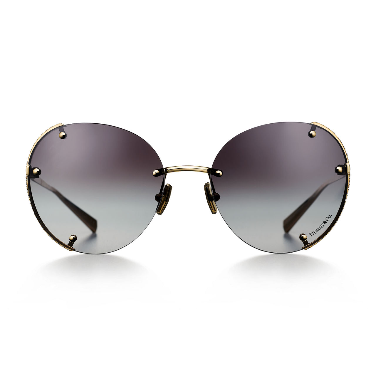 Sonnenbrille aus vergoldetem Metall mit Gläsern mit grauem Farbverlauf
