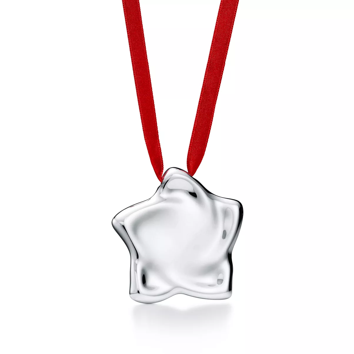Star Ornament in Sterling Silver on a Red Ribbon