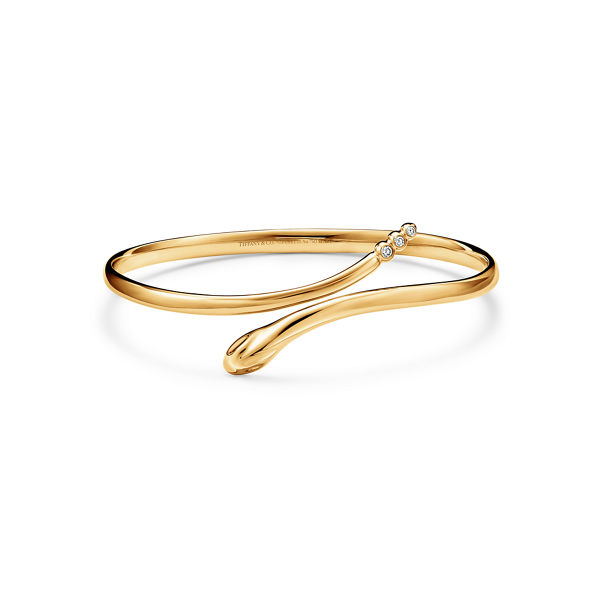 Elsa Peretti®:Snake Bangle in Yellow Gold with Diamonds