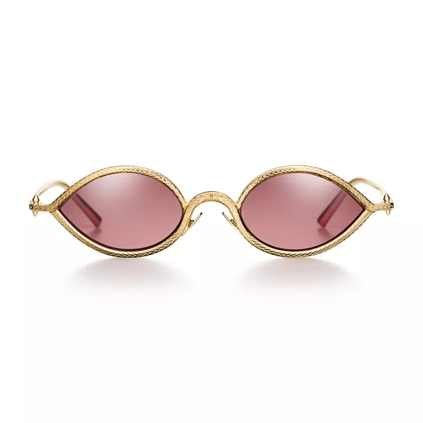 Solaires en or avec verres cristal rouges