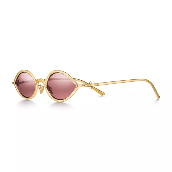 Solaires en or avec verres cristal rouges
