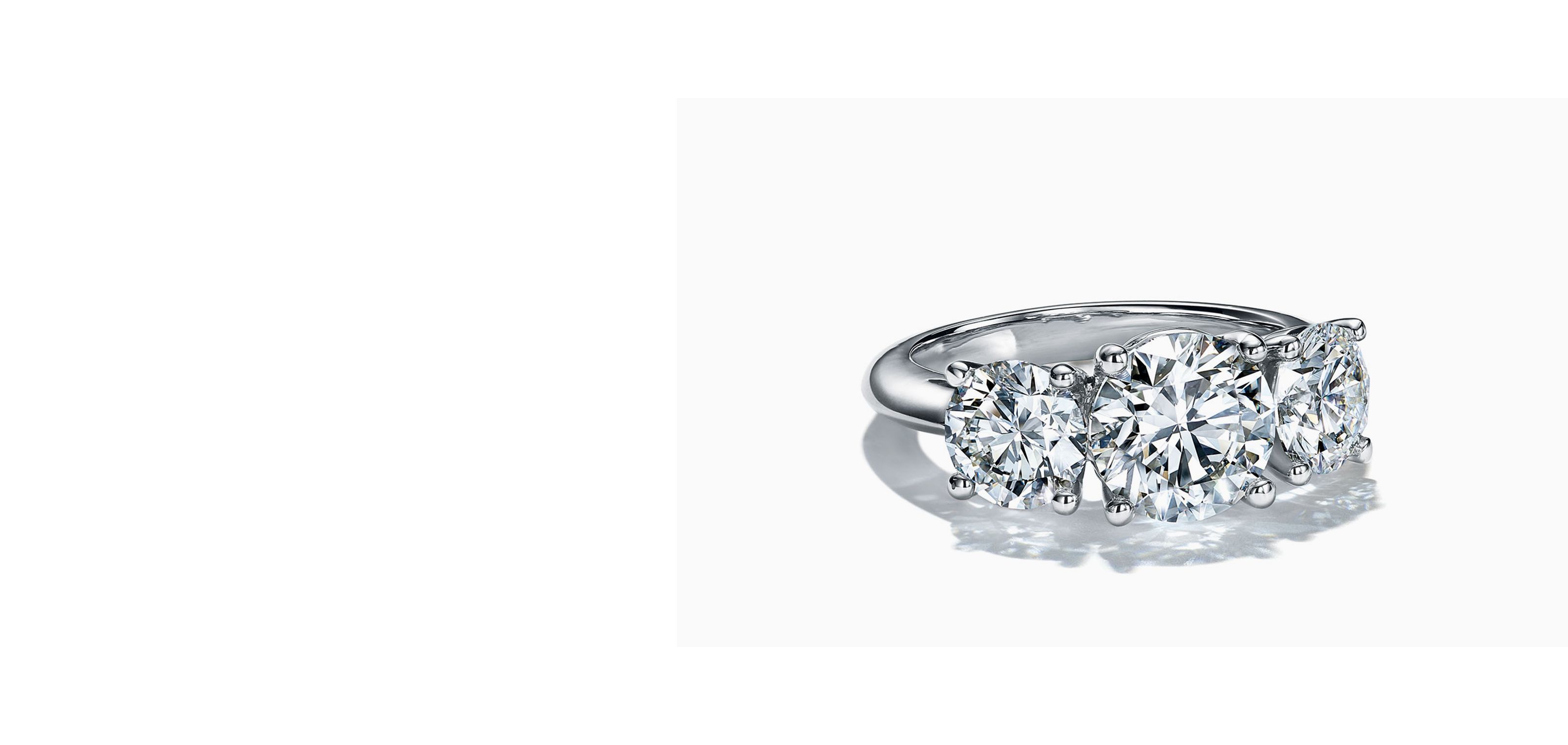 Tiffany three stone engagement ring shop with baguette side stones in platinum