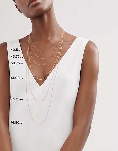 Model displaying necklace sizes