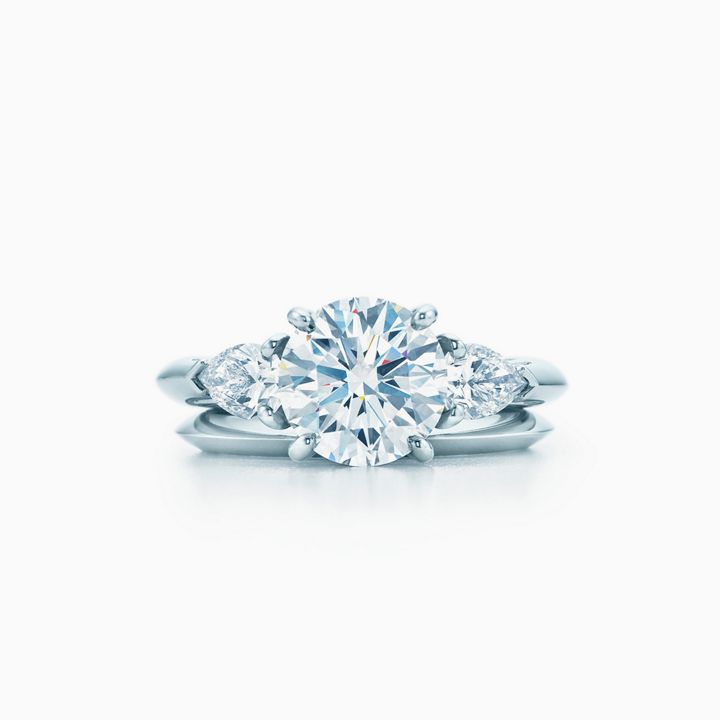 Tiffany Three Stone engagement ring with pear-shaped side stones in