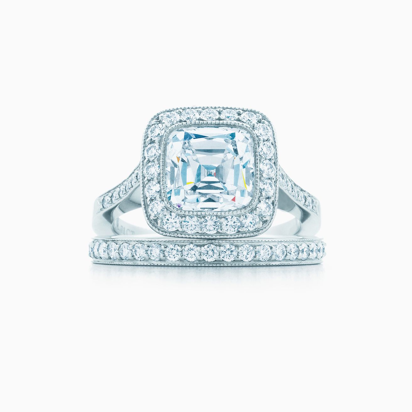 Tiffany Legacy® engagement ring with a diamond band in platinum. Tiffany & Co.