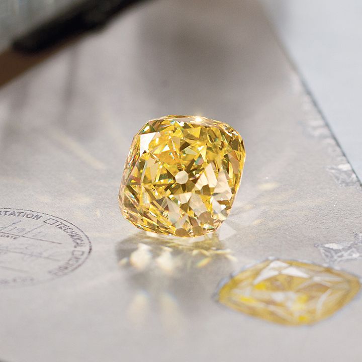 128.54 carats fancy yellow diamond and named the Tiffany Diamond.
